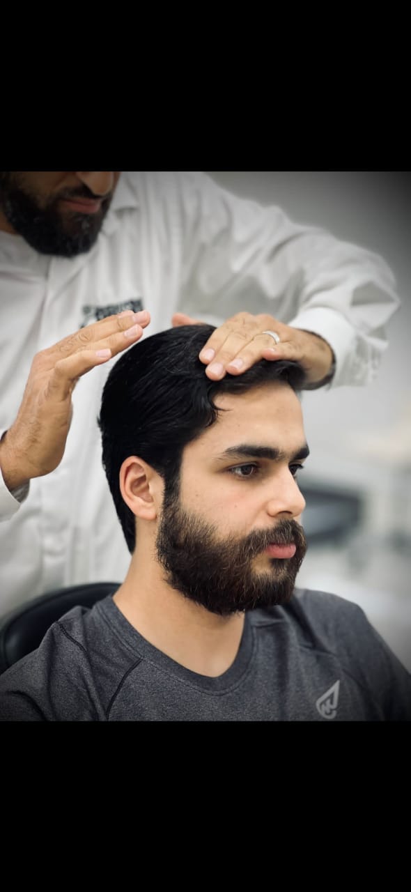 صورة الحلاق